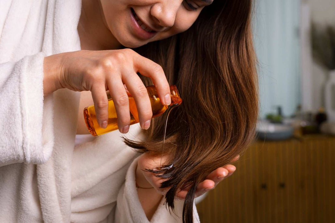 A woman holding a bottle of nourishing oil and capsules, symbolizing the combination of hair oil growth, hair and protein care. natural scalp oil treatment, herbal oil for hair fall, keratin protein care, nourishing oil therapy, healthy hair routine