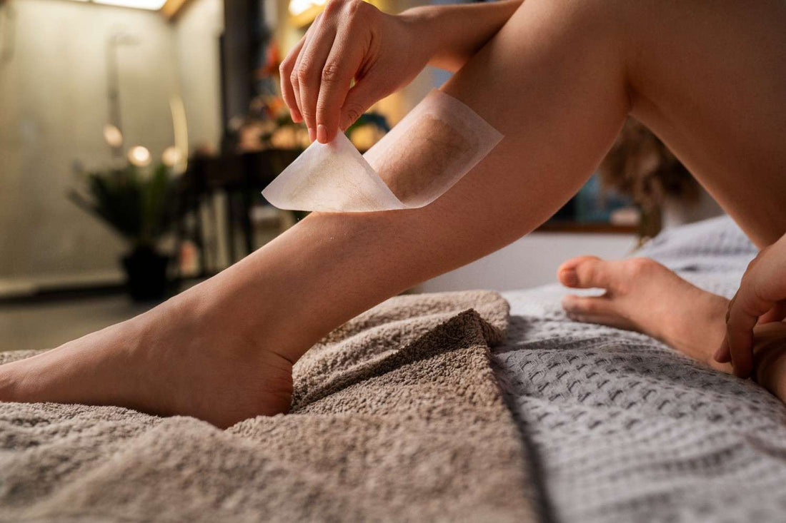 A woman waxing her short hair & checking regrowth after waxing. post waxing hair care, hair regrowth cycle, smooth skin routine